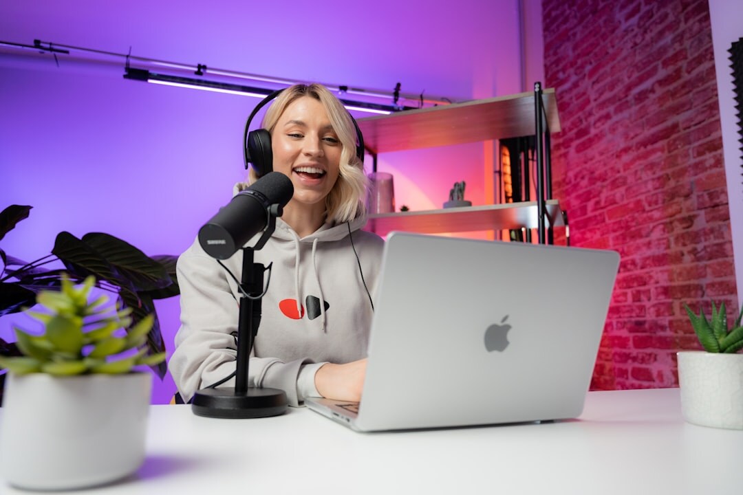 Bright reception area of a podcast studio with acoustic panels on the walls