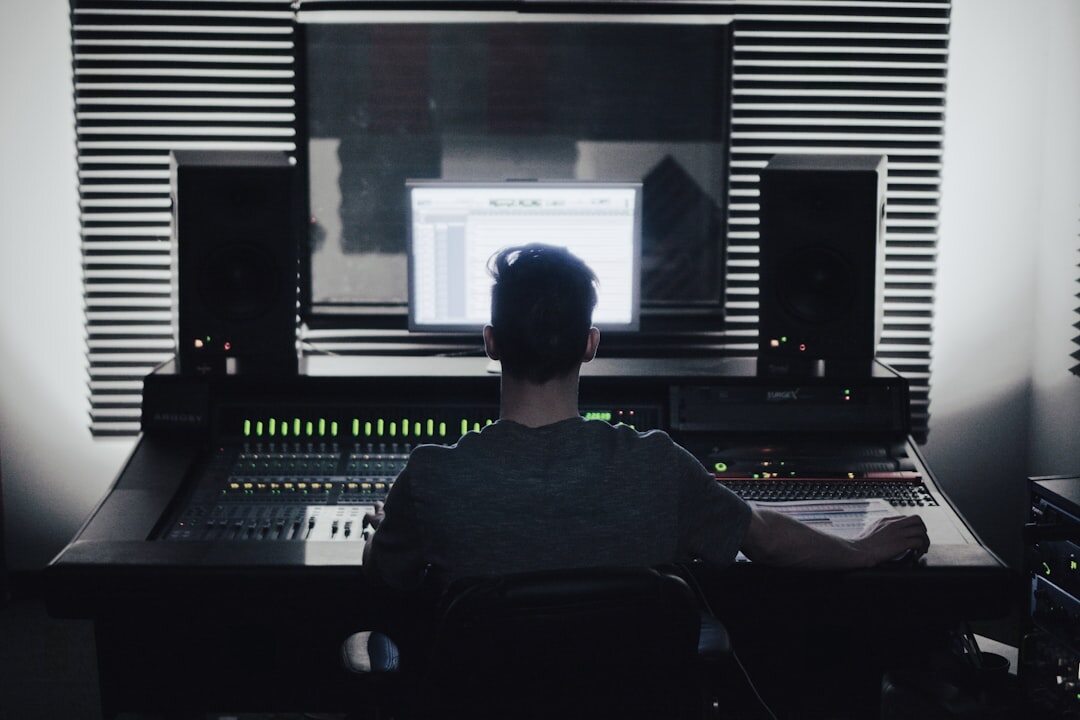 sound engineer at mixing console
