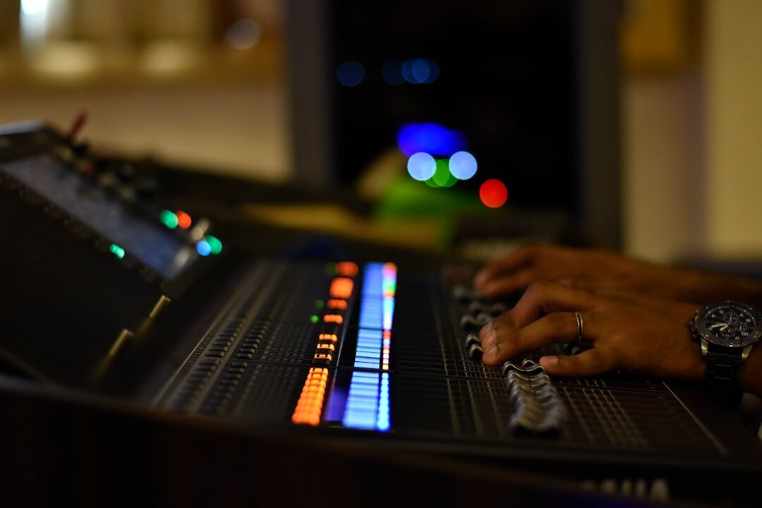 sound engineer at mixing console